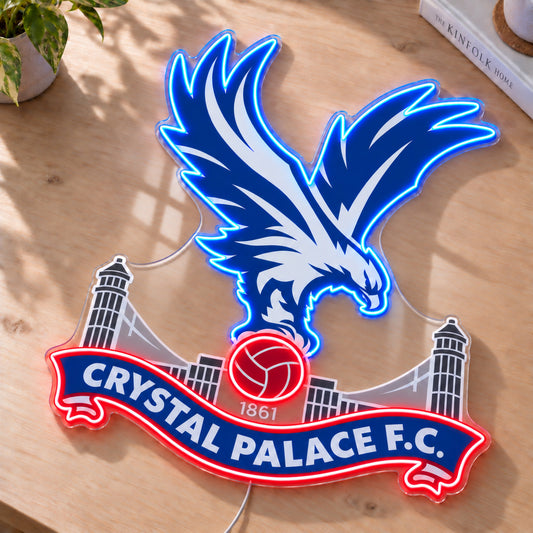 Crystal Palace LED Neon Sign, featuring team logo displayed on a wooden surface.