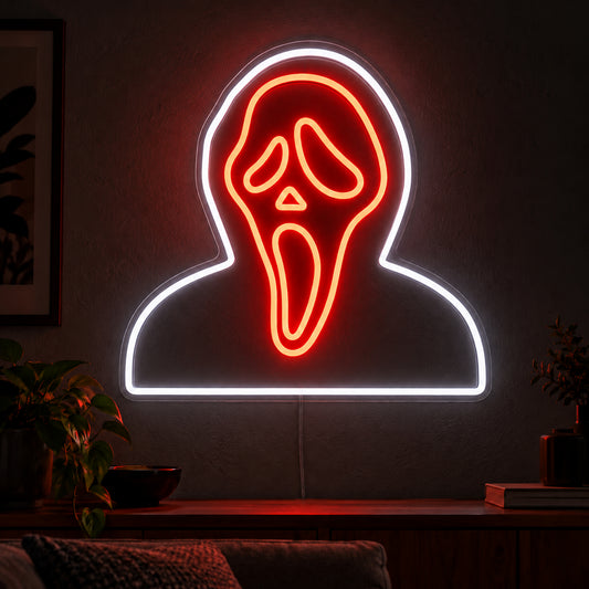Hooded Ghostface Neon Sign featuring an orange Ghostface mask framed by a white hood and shoulder outline, displayed on a dark wall above a wooden sideboard.