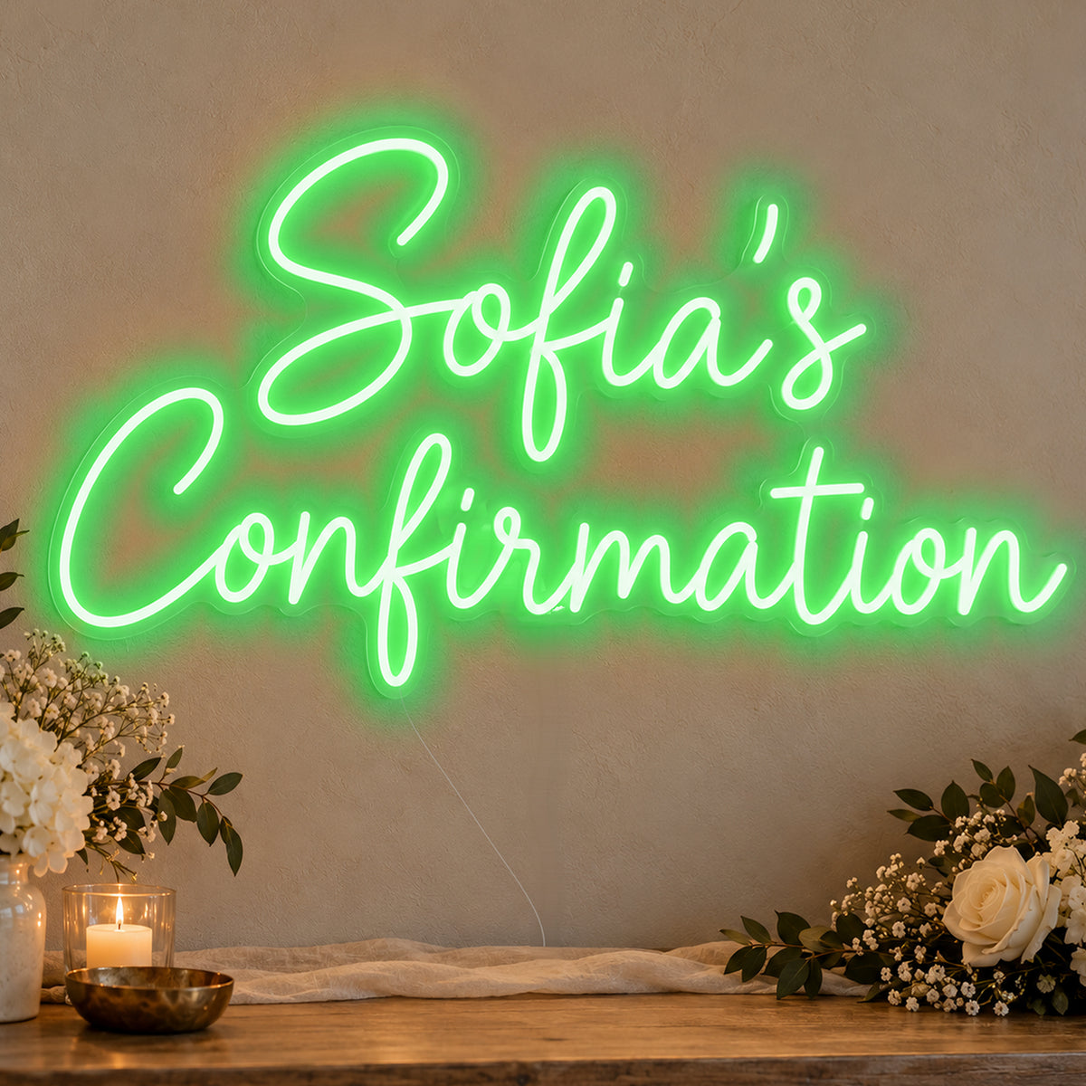 Personalised Confirmation Neon Sign in green LED neon on clear acrylic, angled view