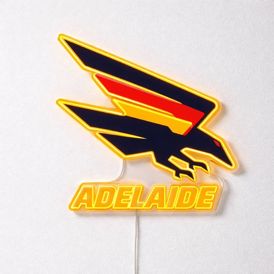 Adelaide Crows Neon Sign, featuring illuminated team logo on a light background.