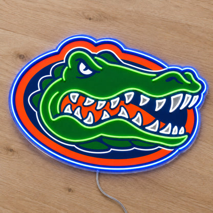 Florida Gators LED Neon Sign, featuring team logo displayed on a wooden surface.