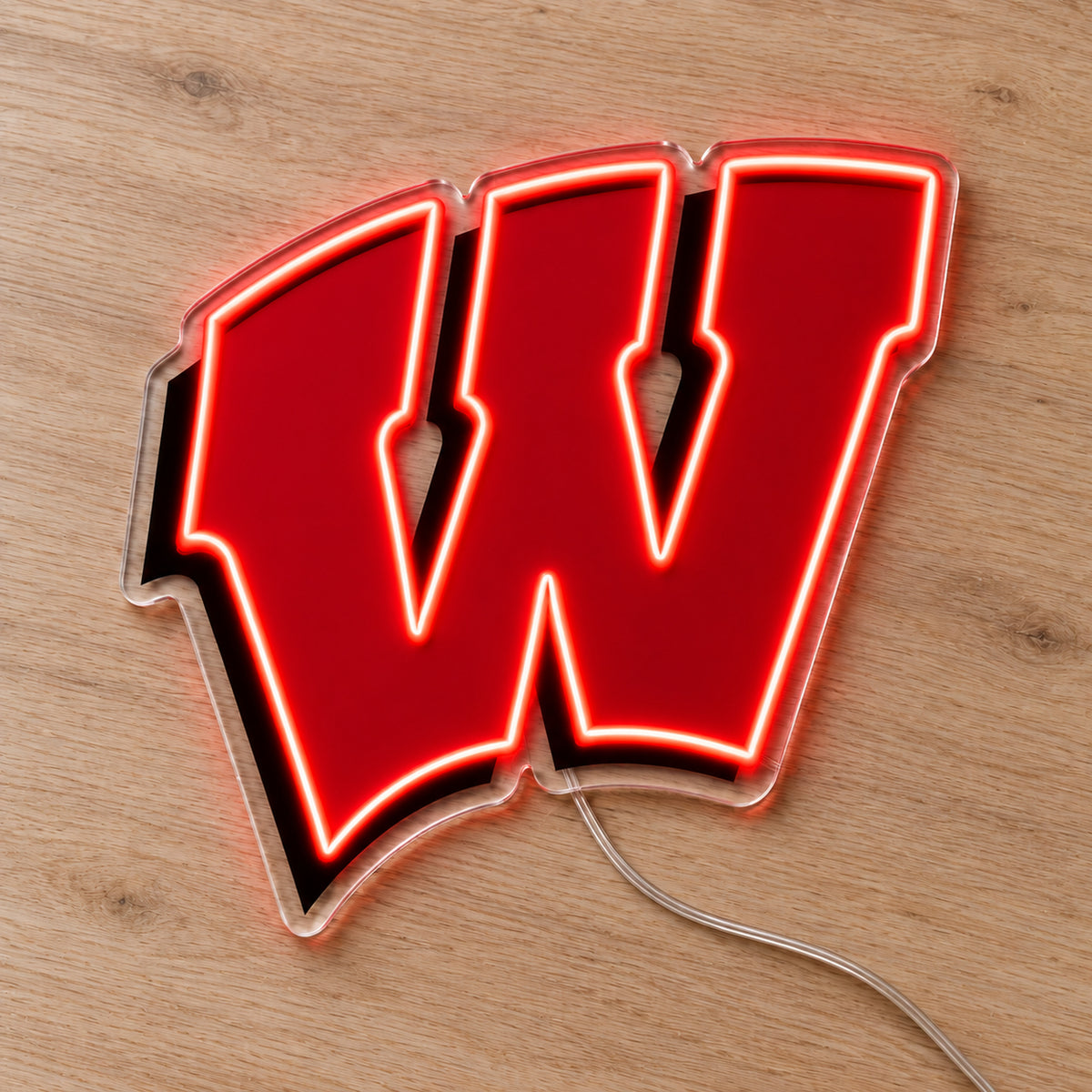 Wisconsin Badgers LED Neon Sign, featuring team logo displayed on a wooden surface.