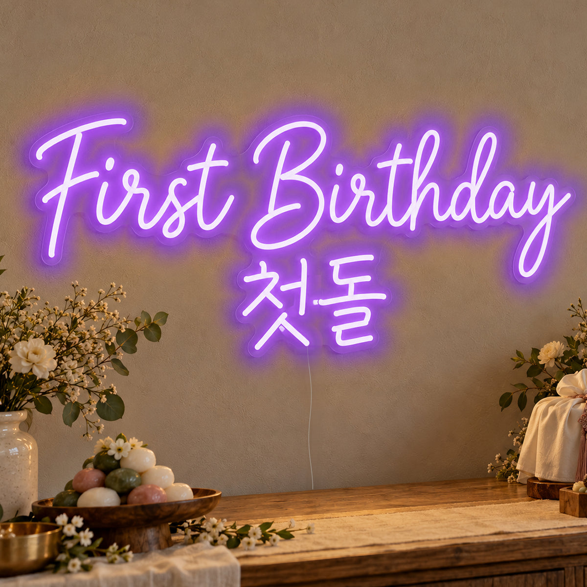 First Birthday English & Korean Neon Sign in purple LED neon on clear acrylic, angled view