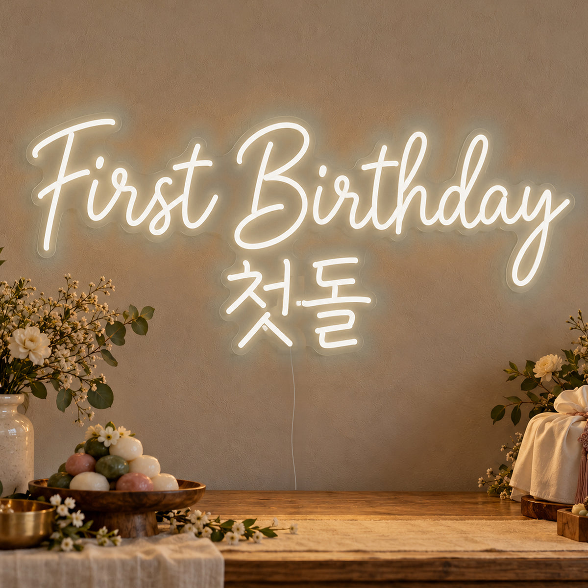 First Birthday English & Korean Neon Sign in warm white LED neon on clear acrylic, angled view
