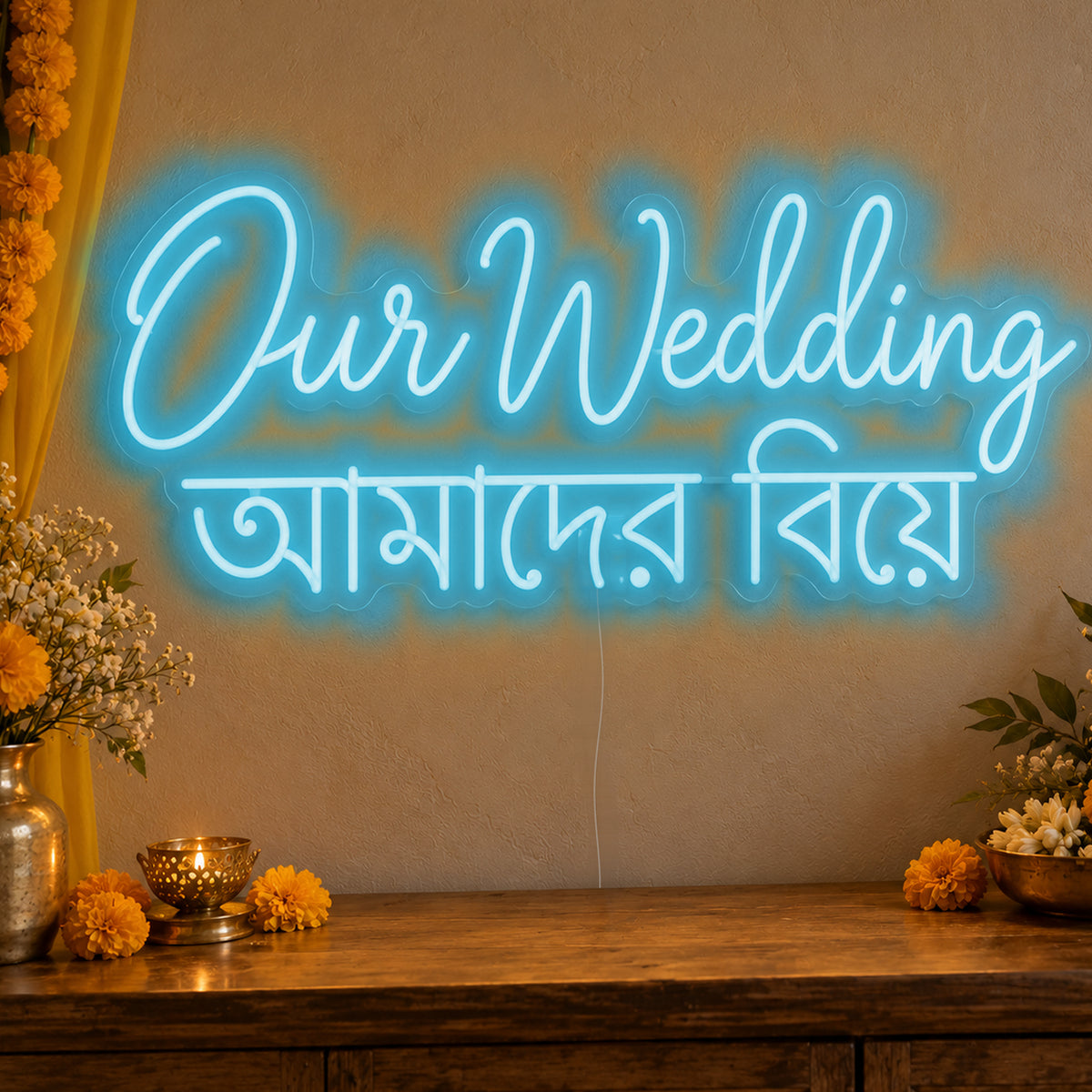 Our Wedding English & Bengali Neon Sign in ice blue LED neon on clear acrylic, angled view