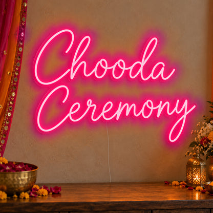 Chooda Ceremony Neon Sign in rose red LED neon on clear acrylic, angled view