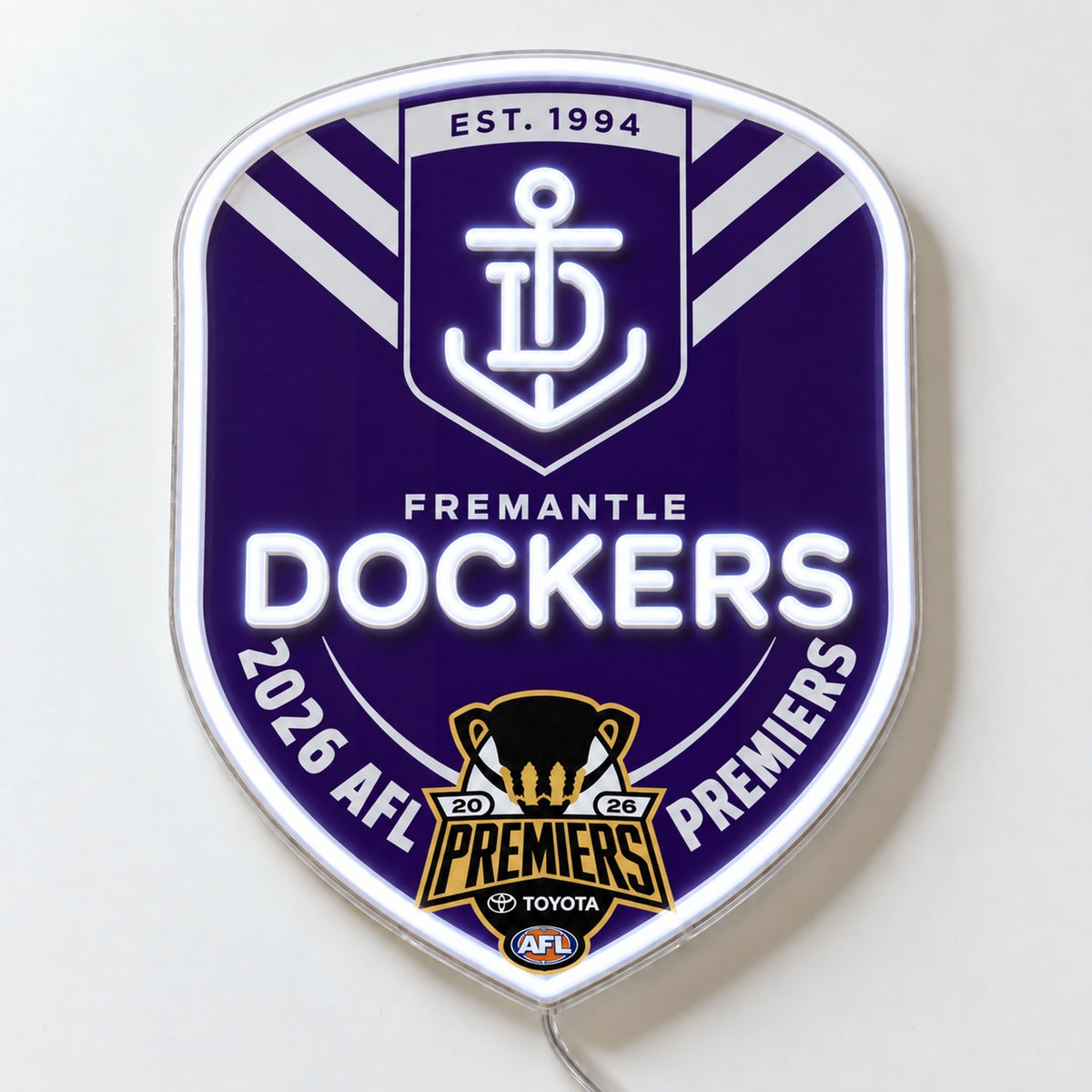 Fremantle Dockers 2026 AFL Premiers LED neon sign on a white surface, viewed from above