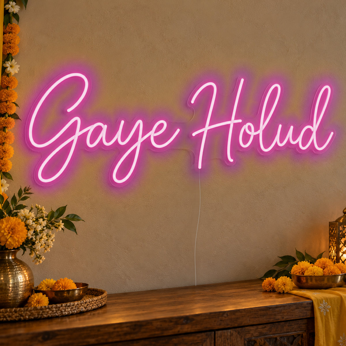 Gaye Holud Neon Sign in pink LED neon on clear acrylic, angled view