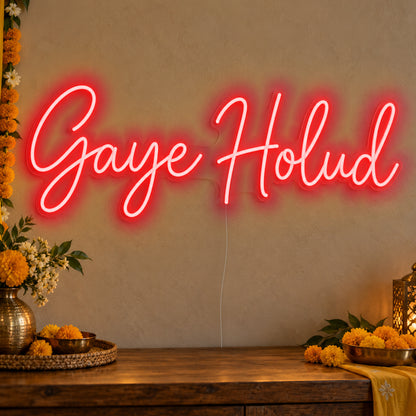 Gaye Holud Neon Sign in red LED neon on clear acrylic, angled view