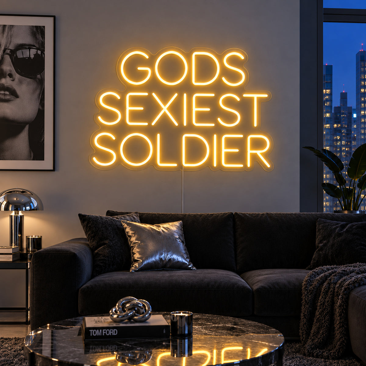 Gods Sexiest Soldier Neon Sign glowing gold in rounded lettering above a dark sofa.