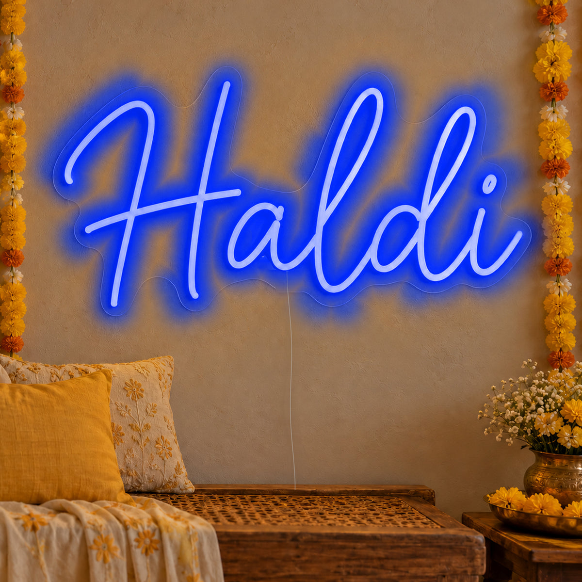 Haldi Neon Sign in blue LED neon on clear acrylic, angled view