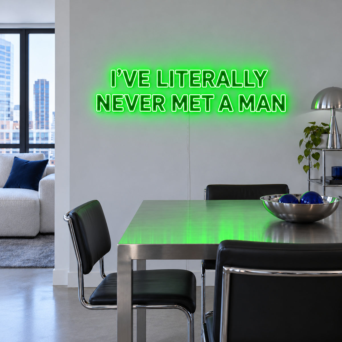 I've Literally Never Met A Man Neon Sign with green lighting, displayed above a dining table.