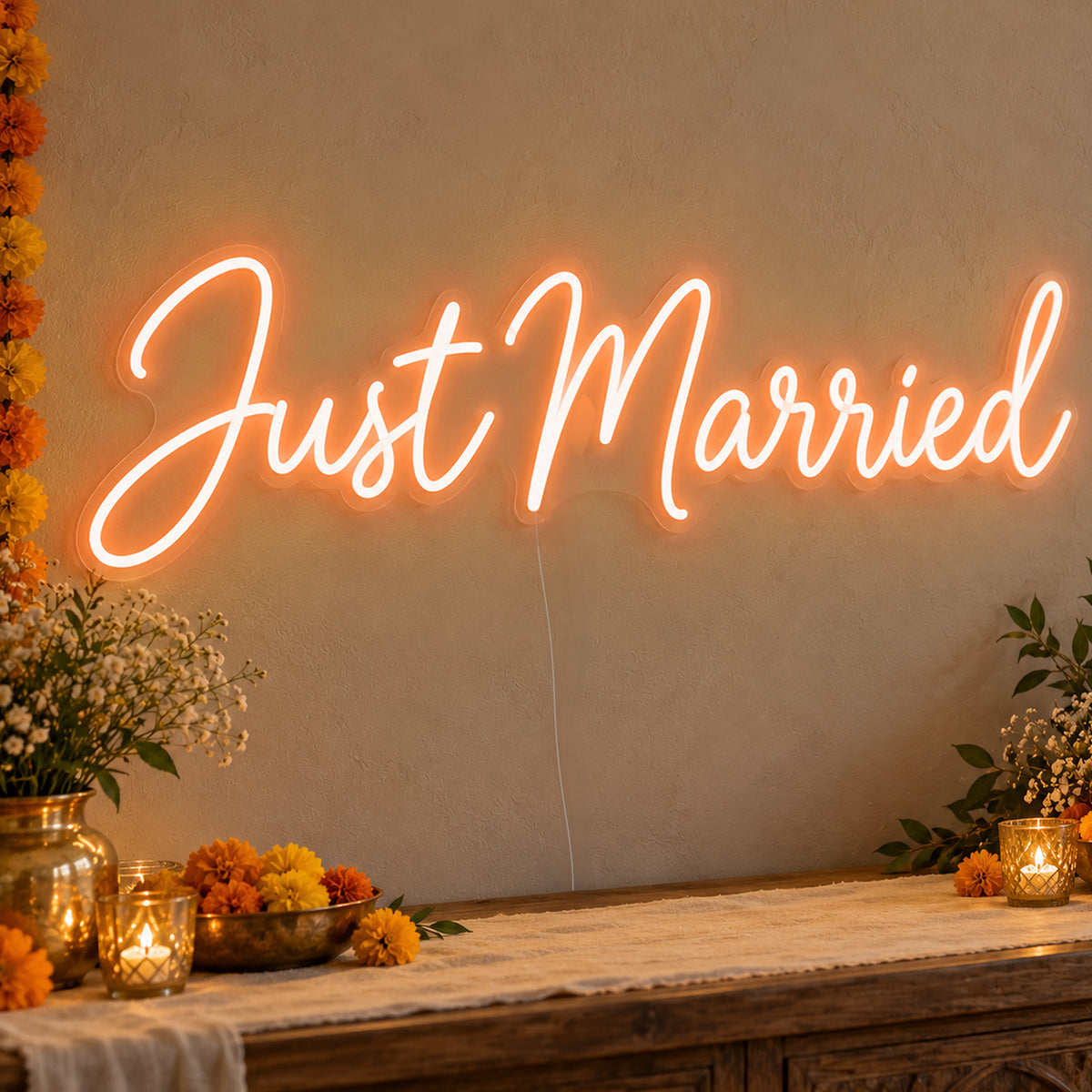 Just Married Neon Sign in orange LED neon on clear acrylic, angled view