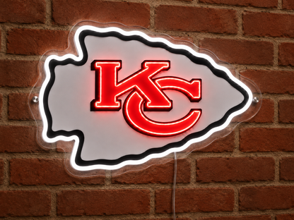 Kansas City Chiefs neon sign glowing on a brick wall