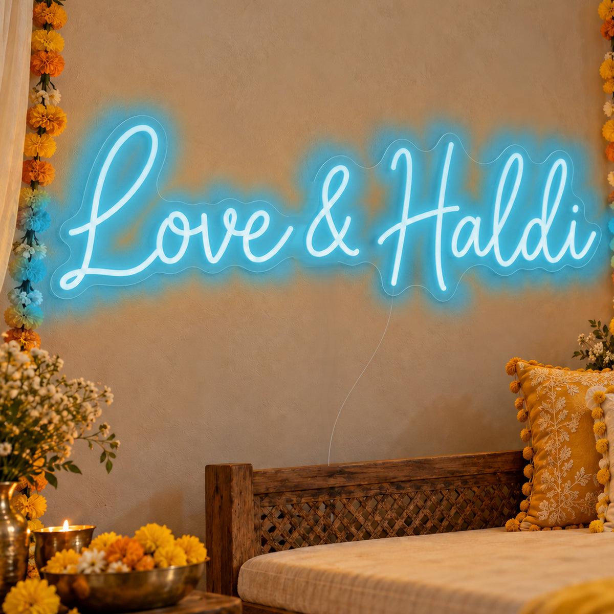 Love Haldi Neon Sign in ice blue LED neon on clear acrylic, angled view