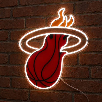 Angled view of Miami Heat neon sign glowing red and orange on a brick wall