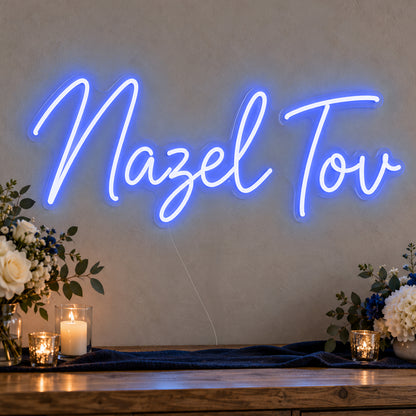 Mazel Tov Blue Neon Sign in blue LED neon on clear acrylic, angled view