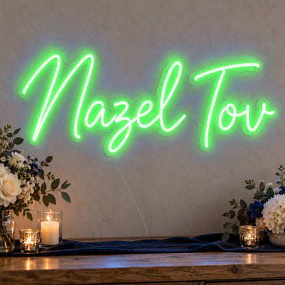 Mazel Tov Blue Neon Sign in green LED neon on clear acrylic, angled view