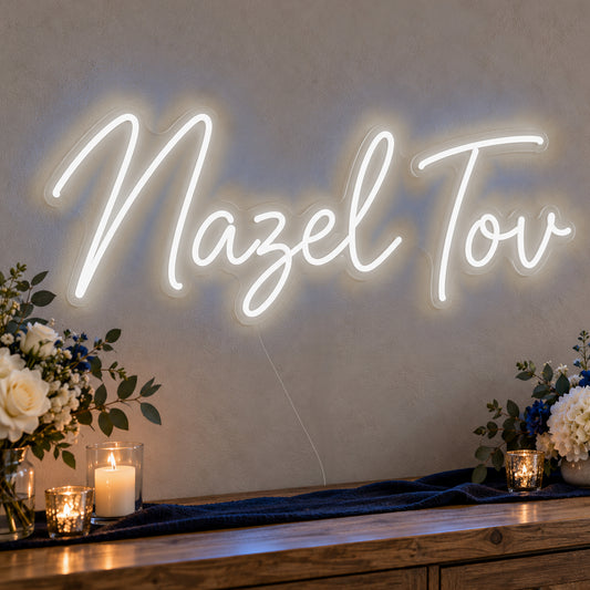 Mazel Tov Blue Neon Sign in white LED neon on clear acrylic, angled view
