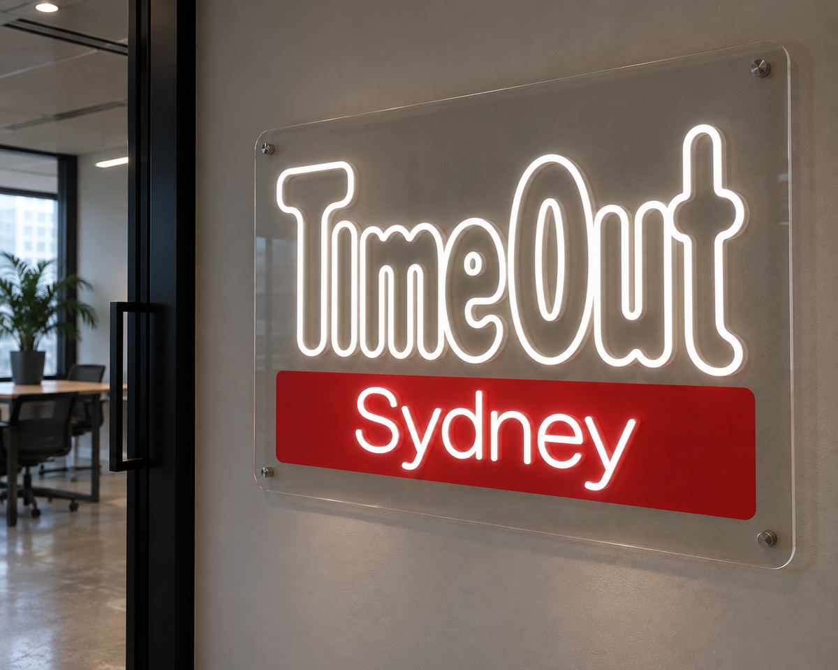 White TimeOut Sydney LED neon sign on clear acrylic, shown as custom sign inspiration for Penrith.