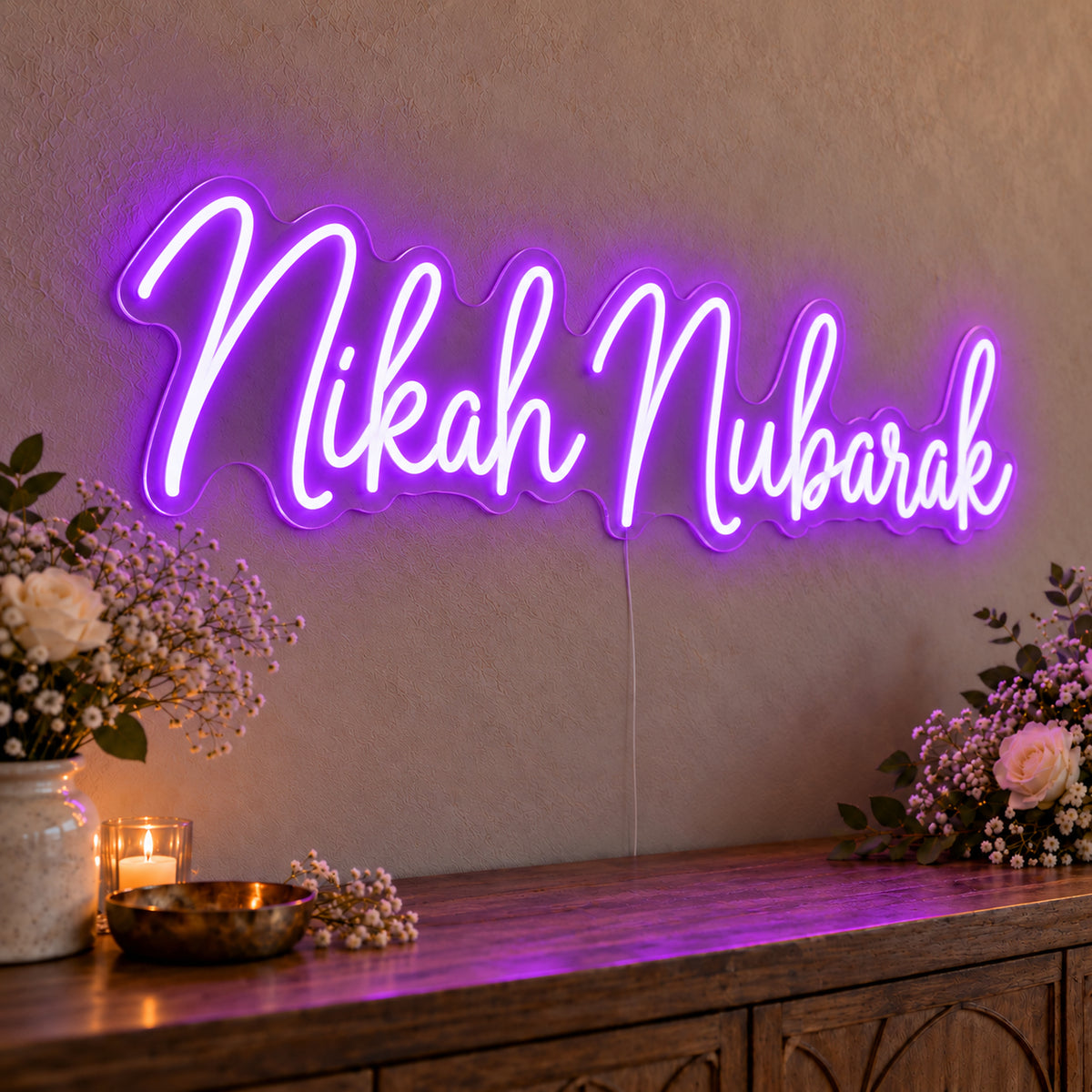Nikah Mubarak Neon Sign in purple LED neon on clear acrylic, angled view