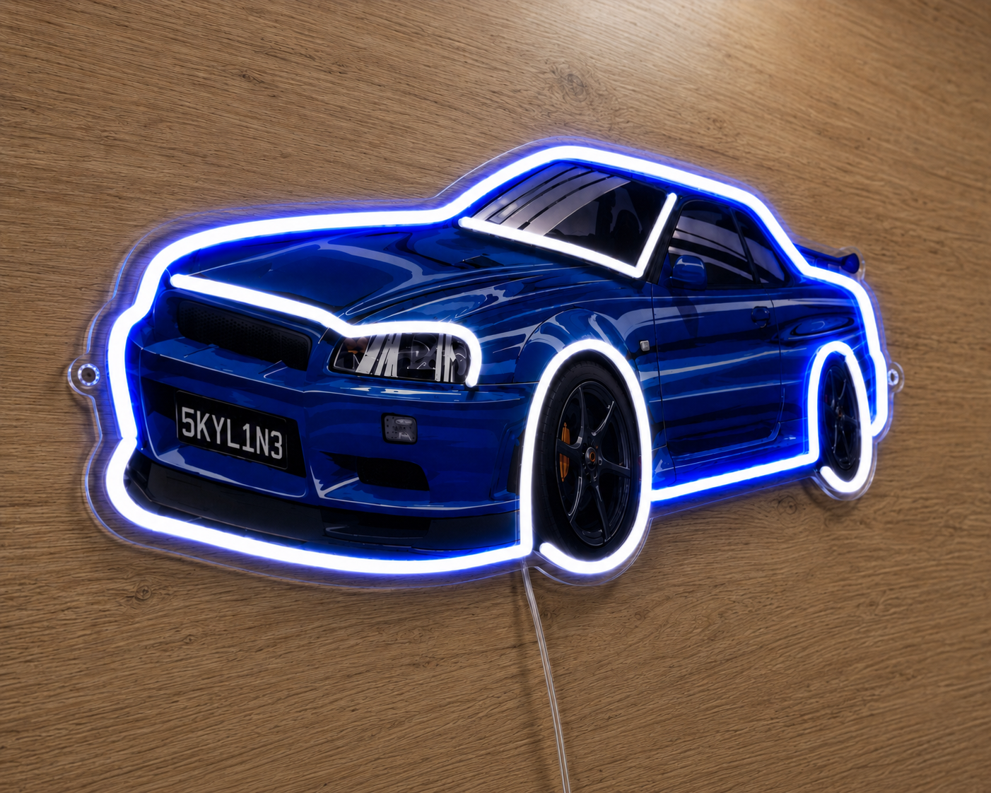 Angled side view of Nissan Skyline R34 GTR neon light sign glowing blue on a wood panel wall