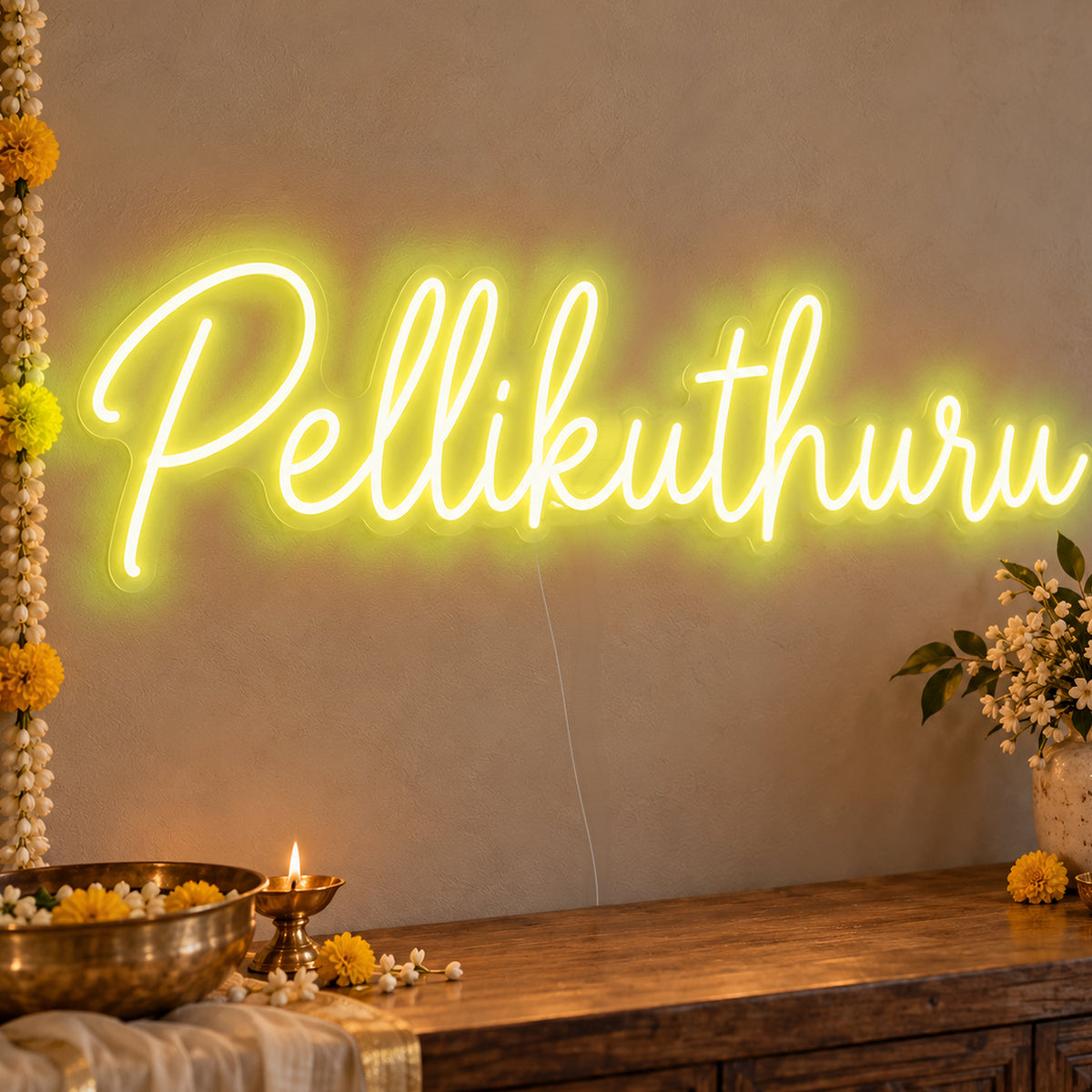 Pellikuthuru Neon Sign in yellow LED neon on clear acrylic, angled view