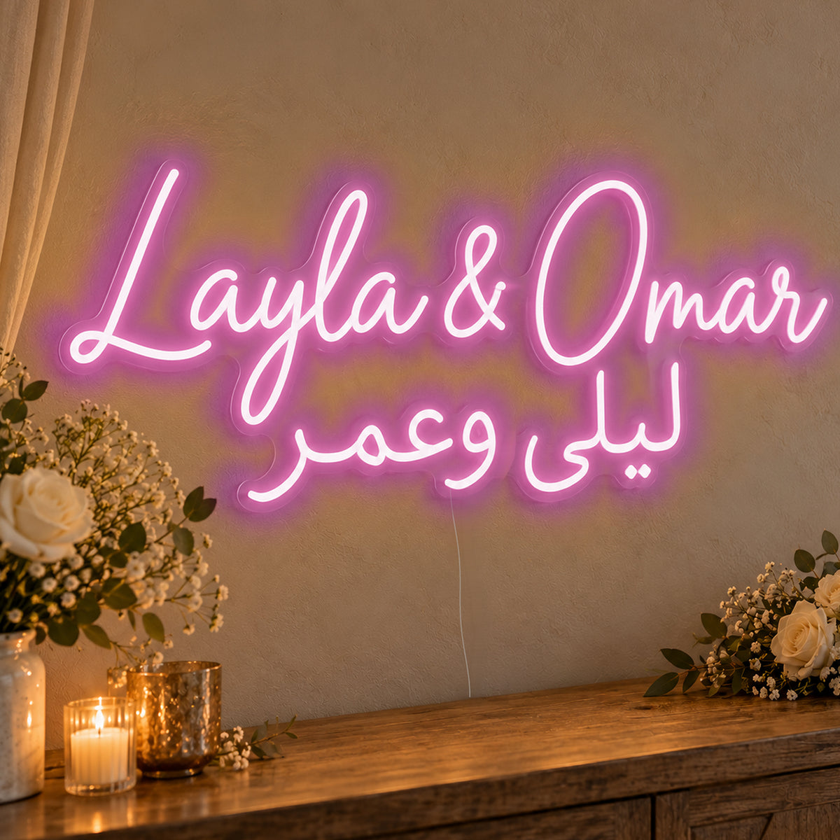 Personalised Bilingual Arabic English Names Neon Sign in pink LED neon on clear acrylic, angled view