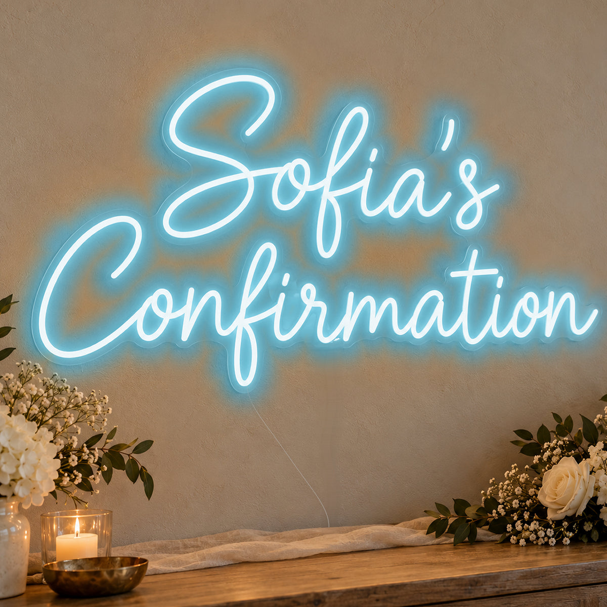 Personalised Confirmation Neon Sign in ice blue LED neon on clear acrylic, angled view