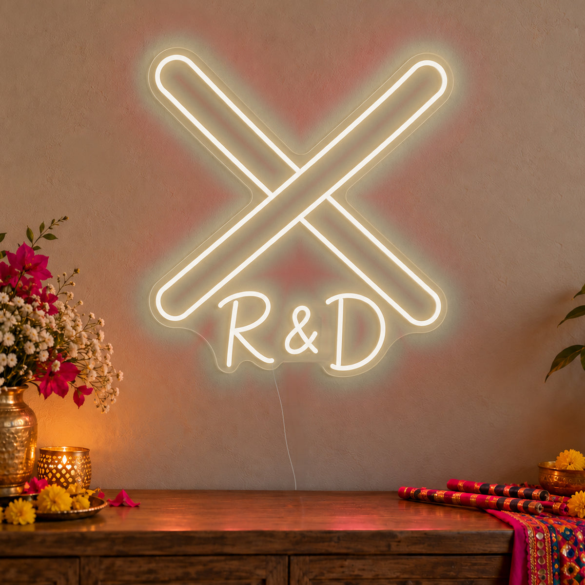 Personalised Dandiya Initials Neon Sign in warm white LED neon on clear acrylic, angled view
