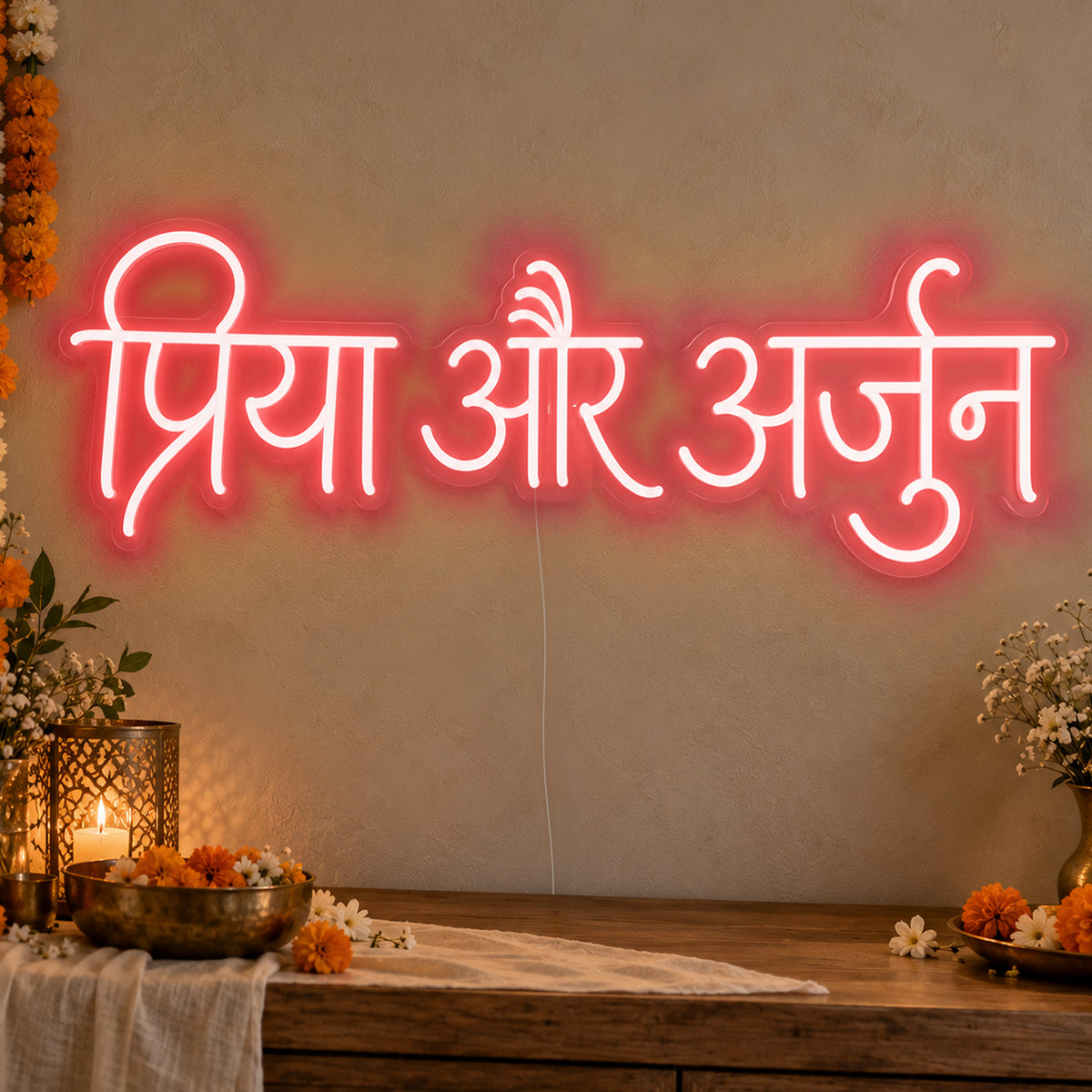 Personalised Devanagari Couple Names Neon Sign in red LED neon on clear acrylic, angled view