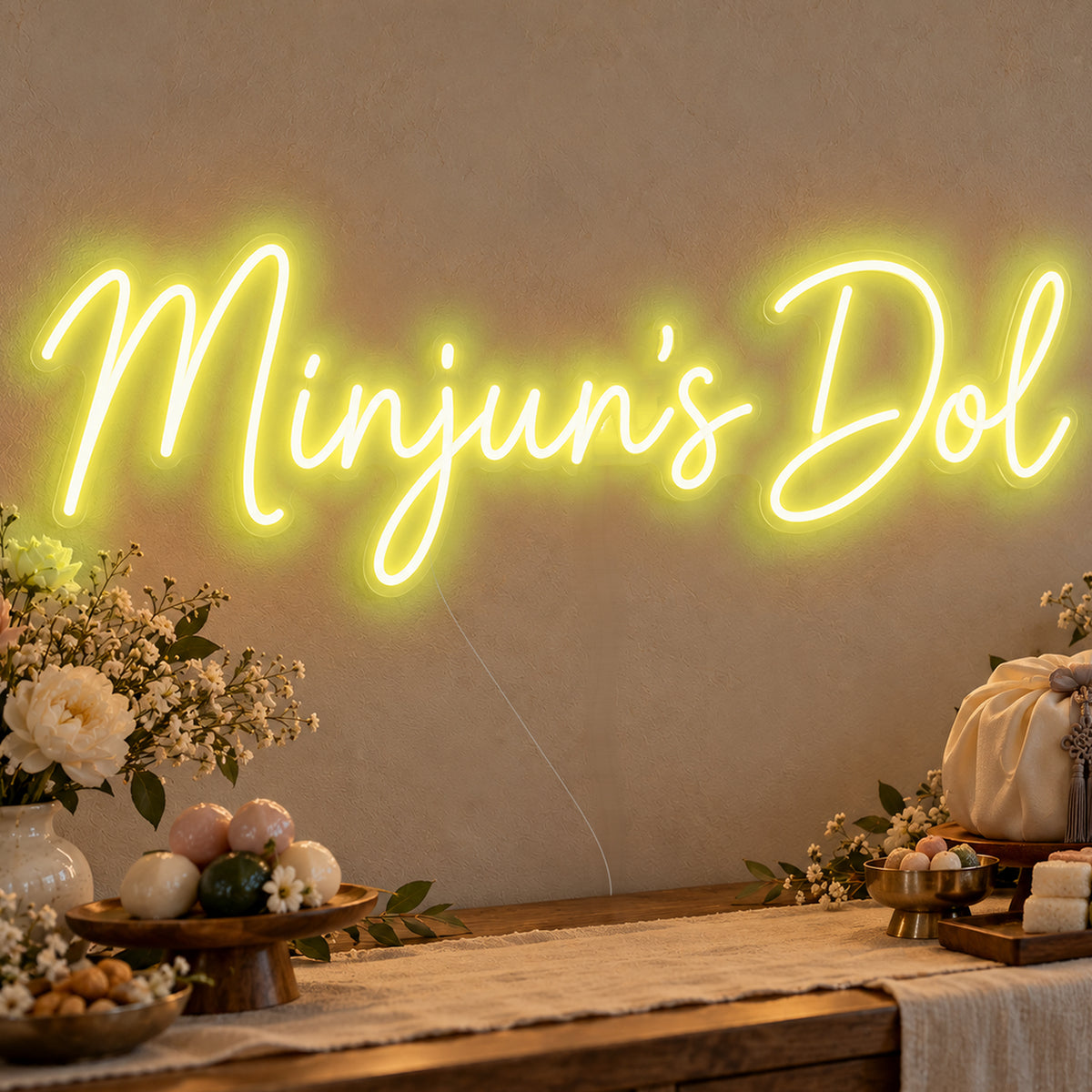 Personalised Dol Neon Sign in yellow LED neon on clear acrylic, angled view