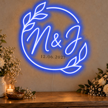 Personalised Filipino Wedding Monogram Neon Sign in blue LED neon on clear acrylic, angled view