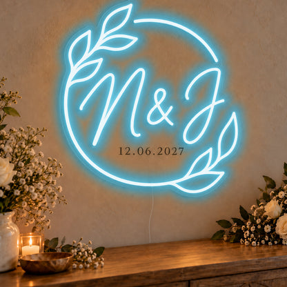 Personalised Filipino Wedding Monogram Neon Sign in ice blue LED neon on clear acrylic, angled view