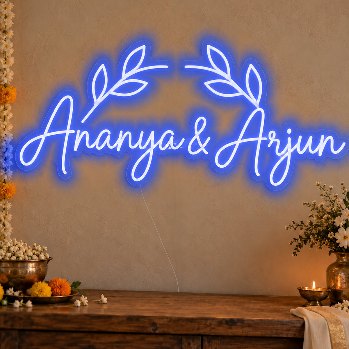 Personalised Floral Arch Names Neon Sign in blue LED neon on clear acrylic, angled view