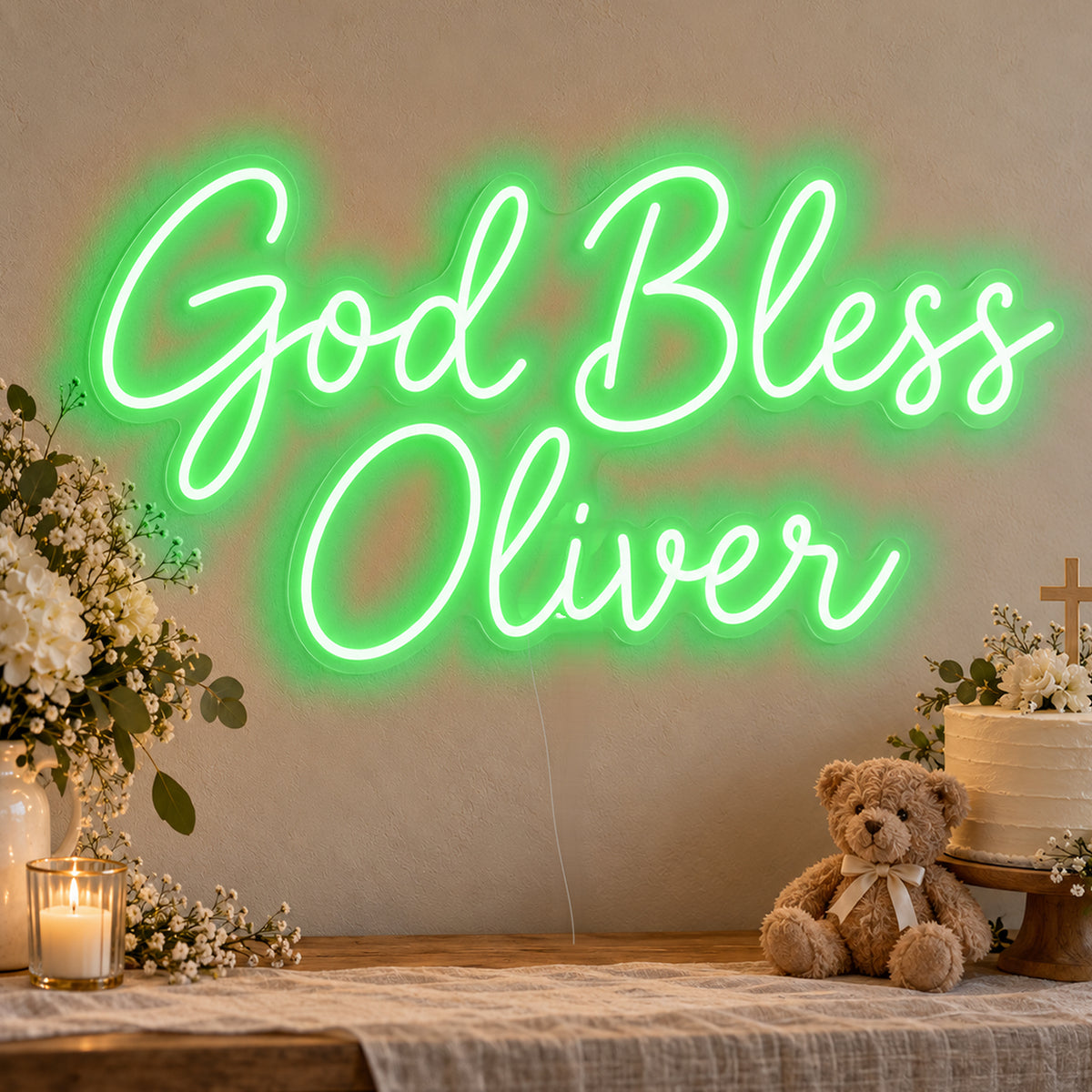 Personalised God Bless Neon Sign in green LED neon on clear acrylic, angled view