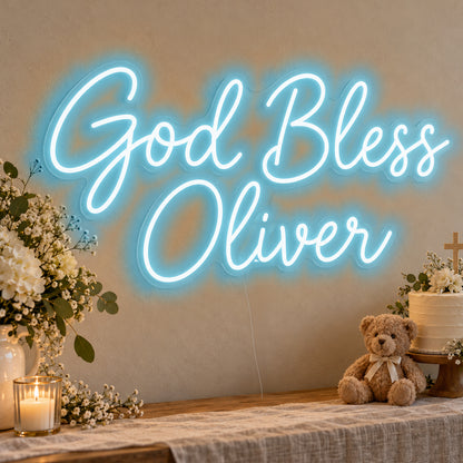 Personalised God Bless Neon Sign in ice blue LED neon on clear acrylic, angled view