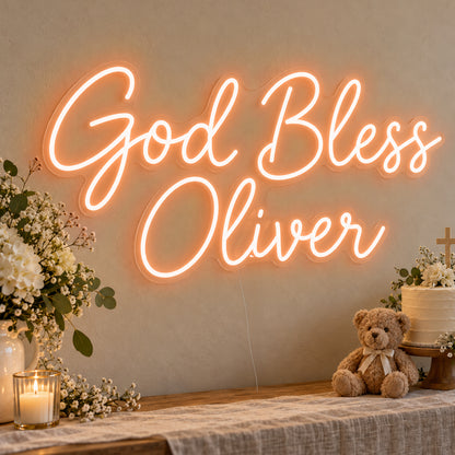 Personalised God Bless Neon Sign in orange LED neon on clear acrylic, angled view