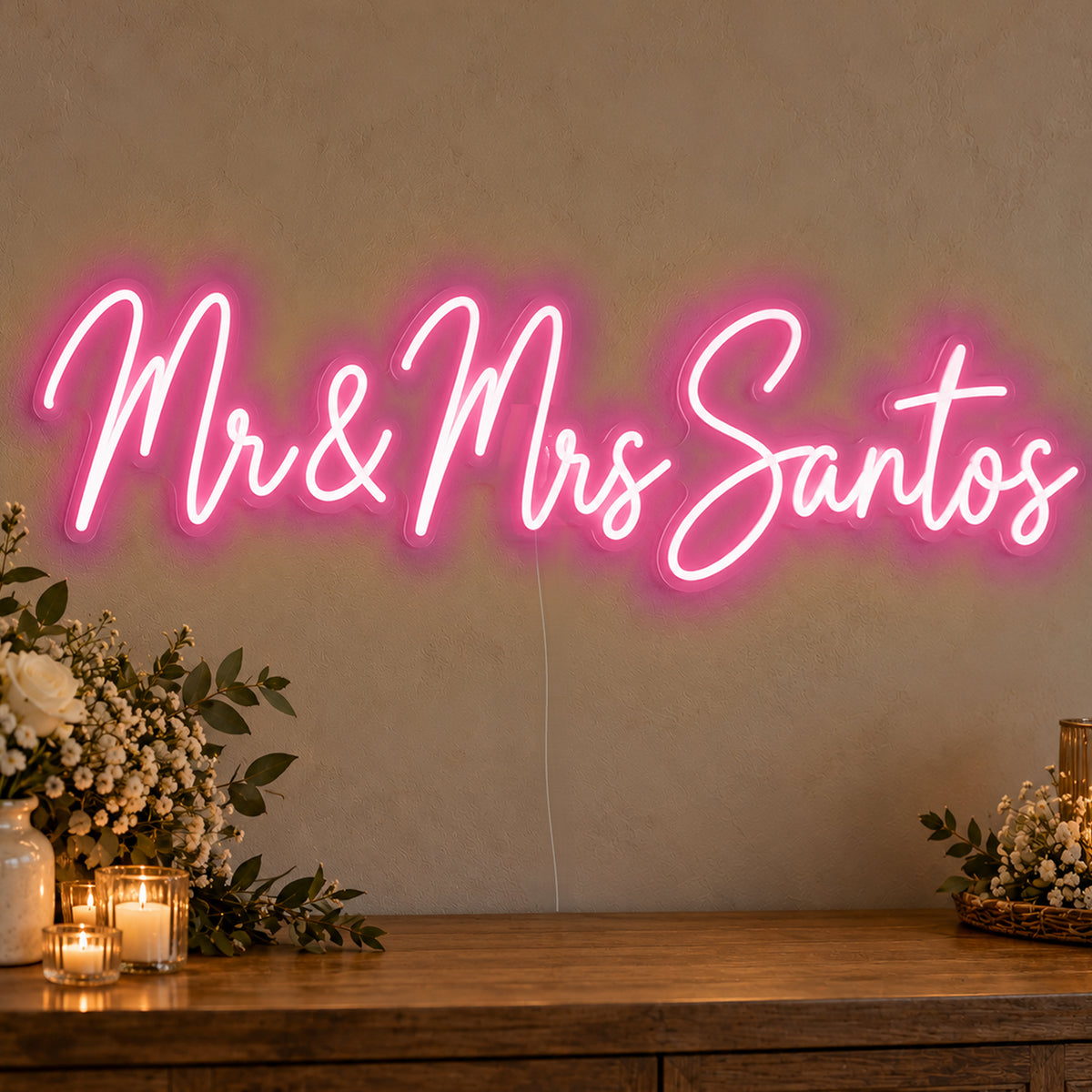 Personalised Mr & Mrs Surname Neon Sign in rose red LED neon on clear acrylic, angled view