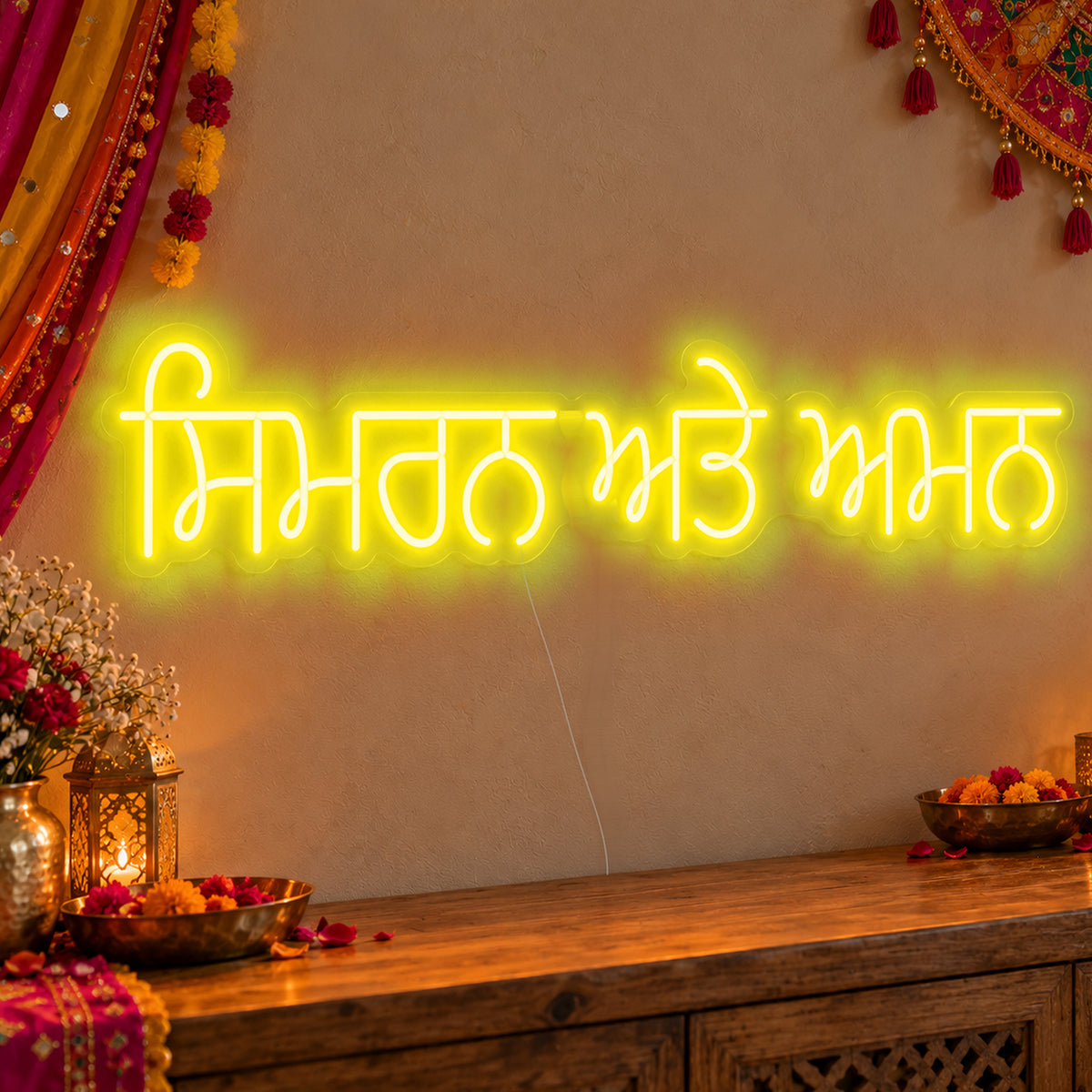 Personalised Punjabi Couple Names Neon Sign in yellow LED neon on clear acrylic, angled view