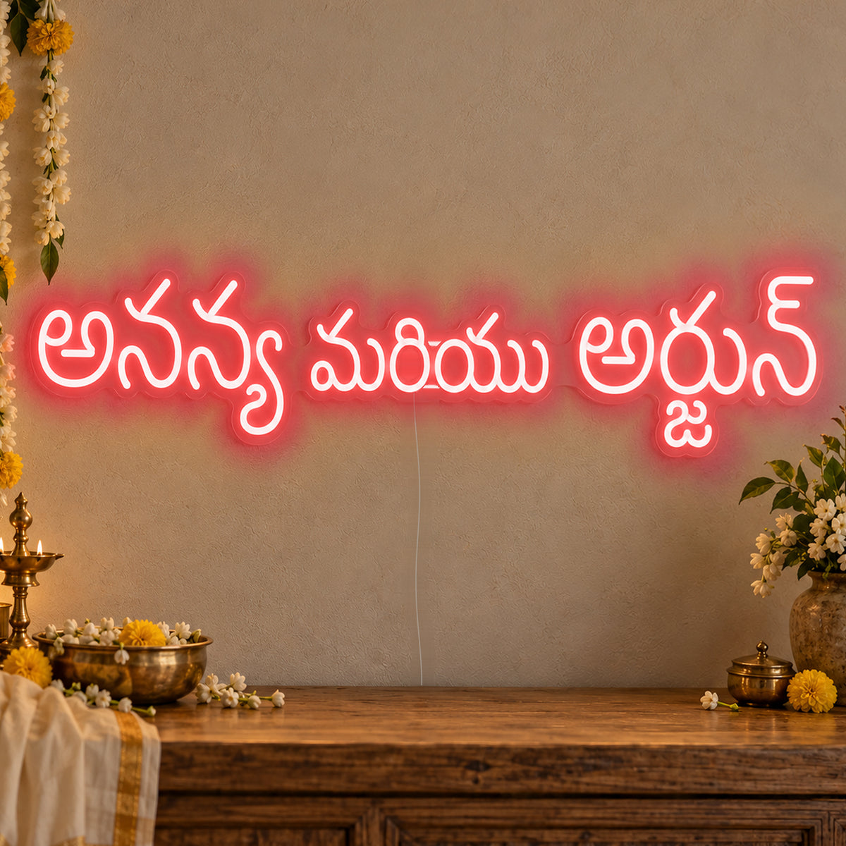 Personalised Telugu Couple Names Neon Sign in red LED neon on clear acrylic, angled view