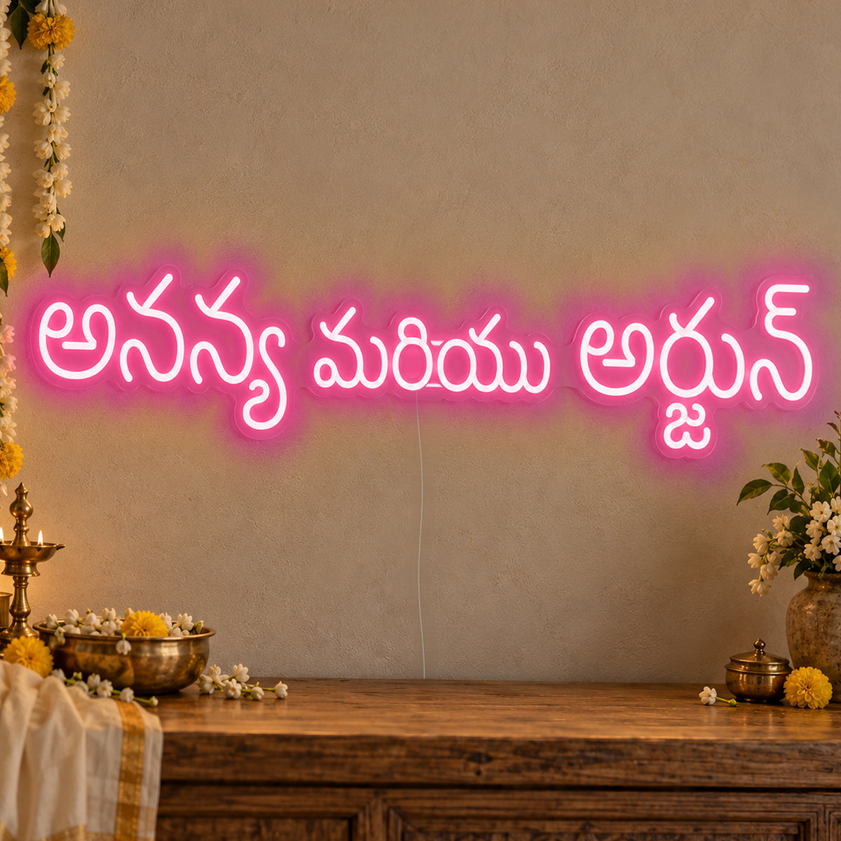 Personalised Telugu Couple Names Neon Sign in rose red LED neon on clear acrylic, angled view