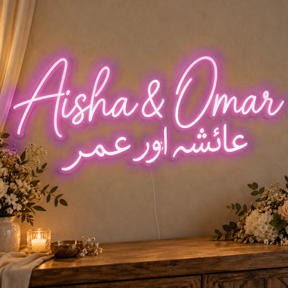 Personalised Two Script Names Neon Sign in pink LED neon on clear acrylic, angled view