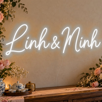 Personalised Vietnamese Couple Names Neon Sign in white LED neon on clear acrylic, angled view