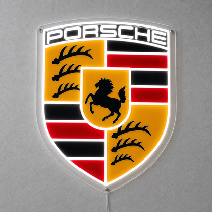 Porsche crest LED neon sign in full colour mounted on a grey wall with white glow