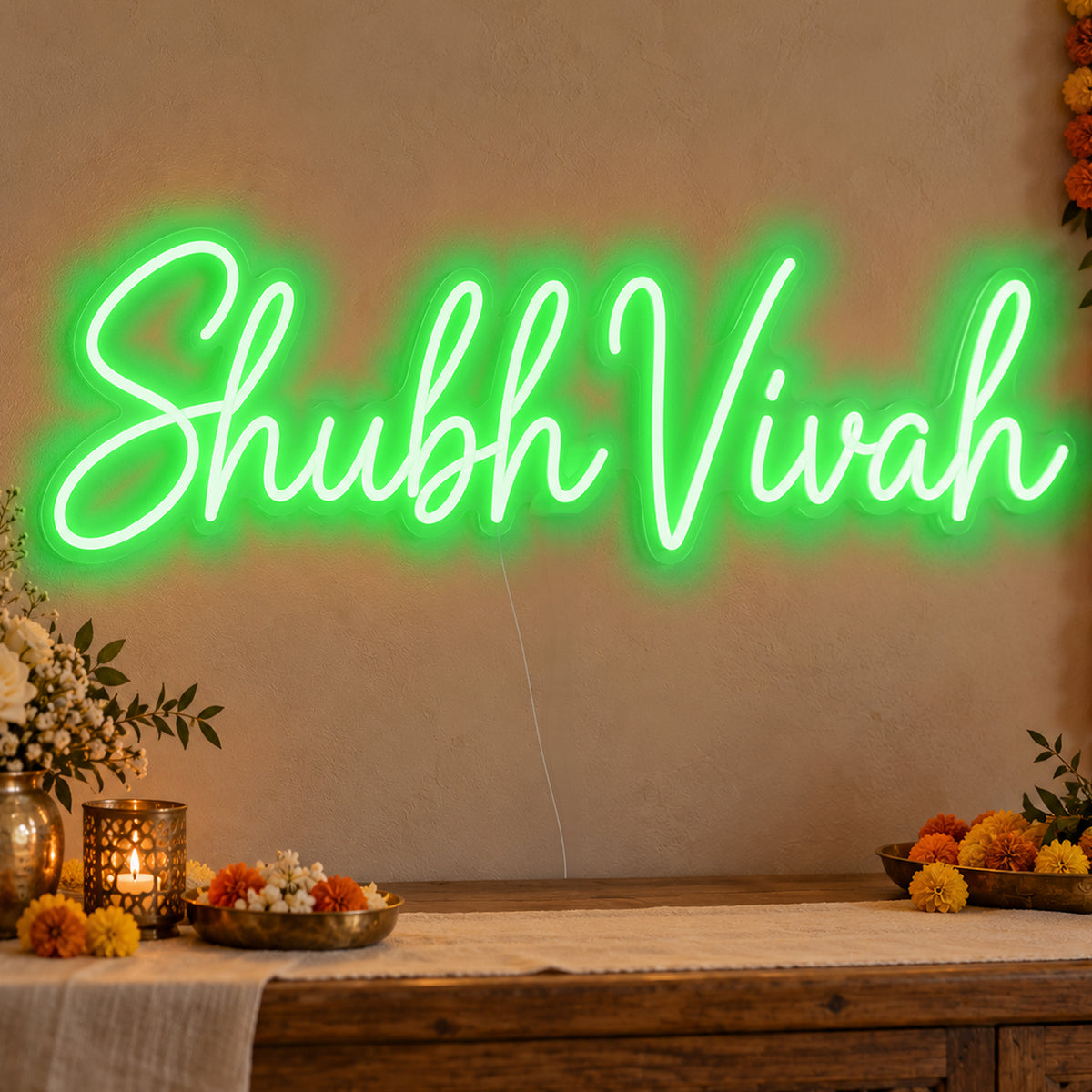 Shubh Vivah Neon Sign in green LED neon on clear acrylic, angled view