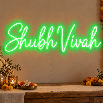 Shubh Vivah Neon Sign in green LED neon on clear acrylic, angled view