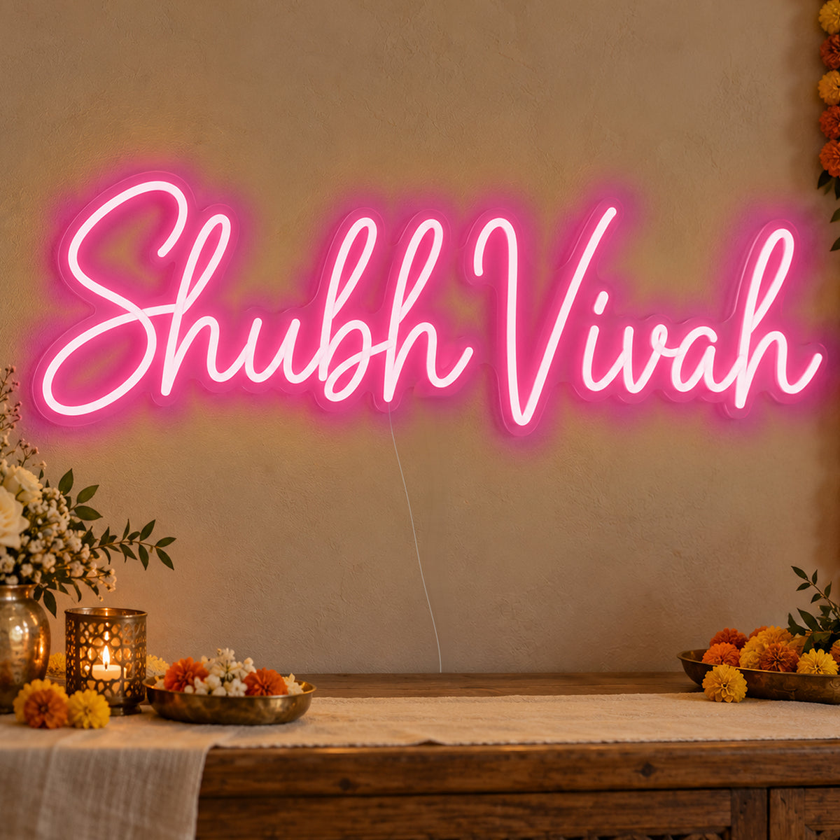 Shubh Vivah Neon Sign in rose red LED neon on clear acrylic, angled view