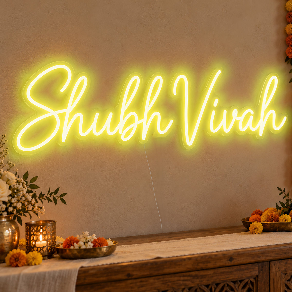Shubh Vivah Neon Sign in yellow LED neon on clear acrylic, angled view