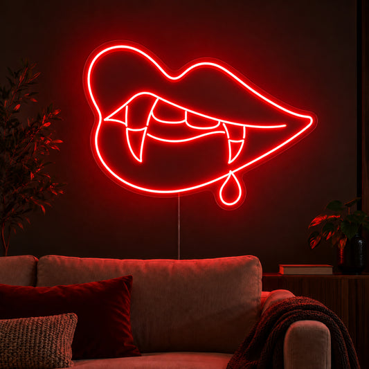 Vampire Lips with Single Blood Drop Neon Sign featuring red lips, pointed fangs and one hanging blood drop, glowing on a dark living room wall.